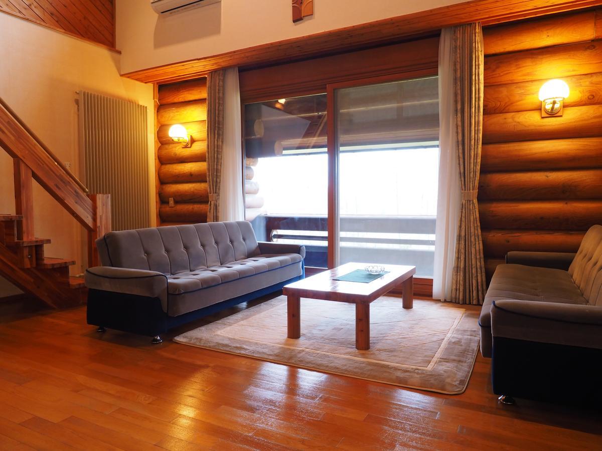 Log Hotel Larch Lake Kanayama Minamifurano Bilik gambar